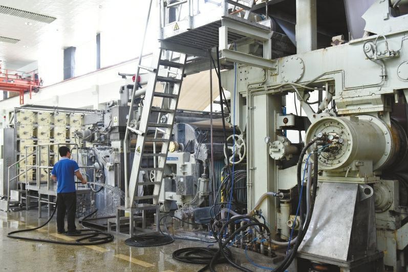 công nhân trong nhà máy in tiền ảnh 2 cong nhan trong nha may in tien anh 2