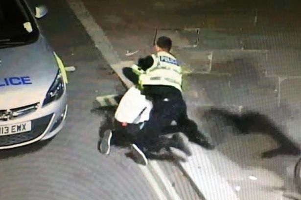 Cuoc vat lon giua canh sat va toi pham giua pho o Anh hinh anh