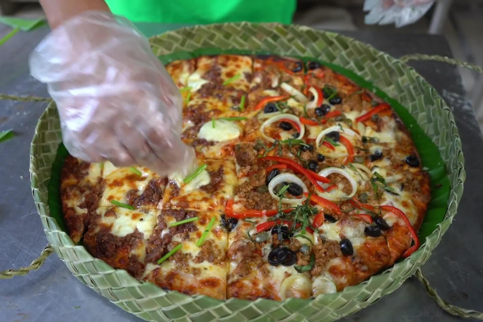 Dung pizza bang hop la dua giup bao ve moi truong o Philippines hinh anh
