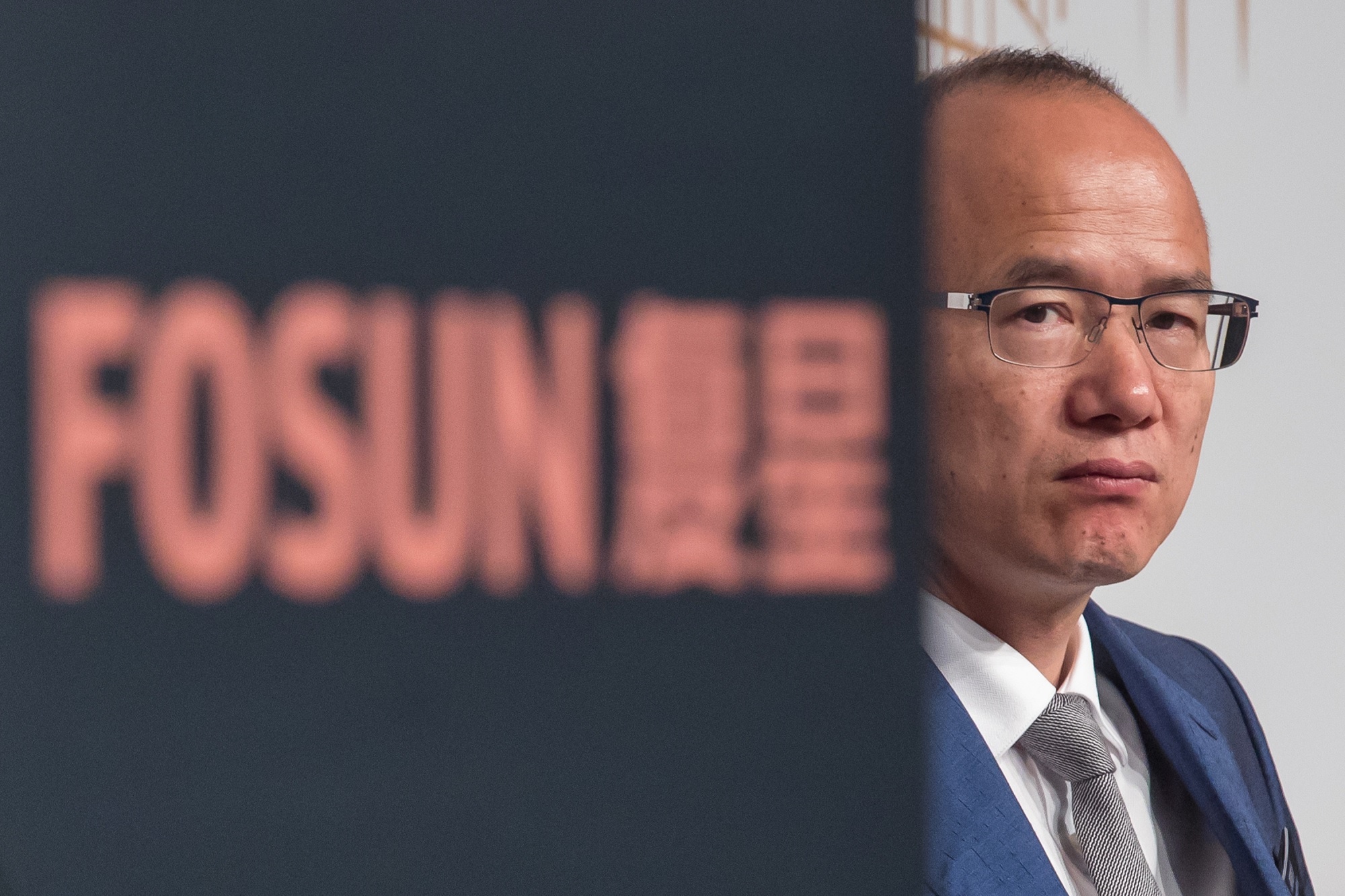 Ket von, 'Warren Buffett Trung Quoc' phai ban nhieu tai san hinh anh