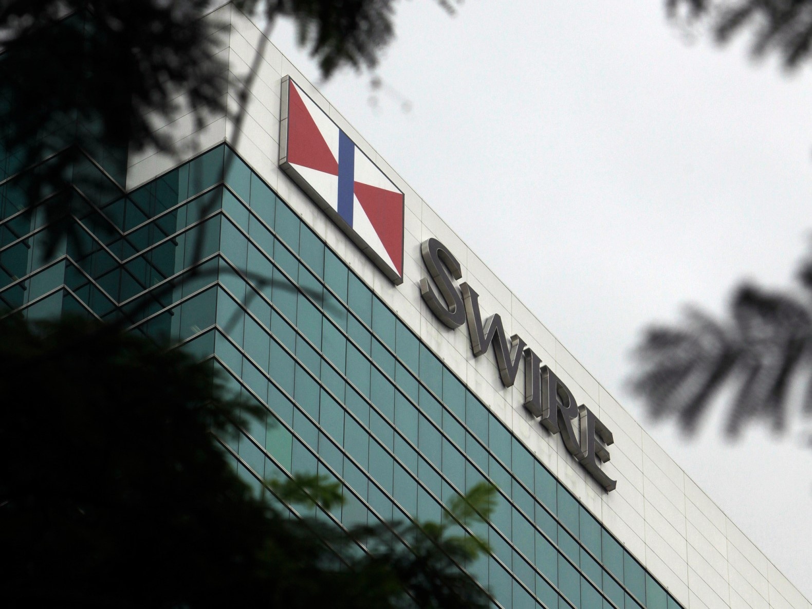 Tap doan Hong Kong ban mang san xuat Coca-Cola o My de tra no hinh anh