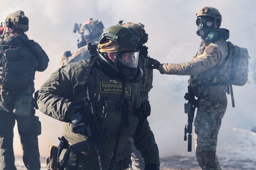 Them nguoi thiet mang, ong Trump noi Minneapolis noi loan hinh anh