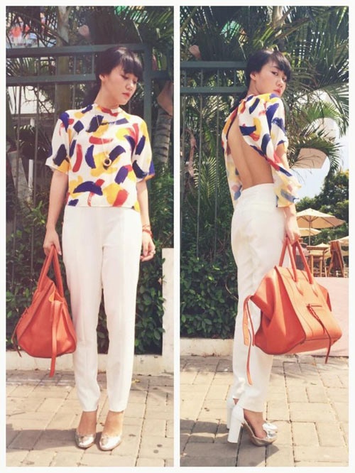 Nhìn từ phía trước, bộ cánh của Văn Mai Hương thật thanh lịch nhưng khi nữ ca sĩ quay lưng cô khiến người đối diện ngạc nhiên trước tấm lưng thật gợi cảm.
