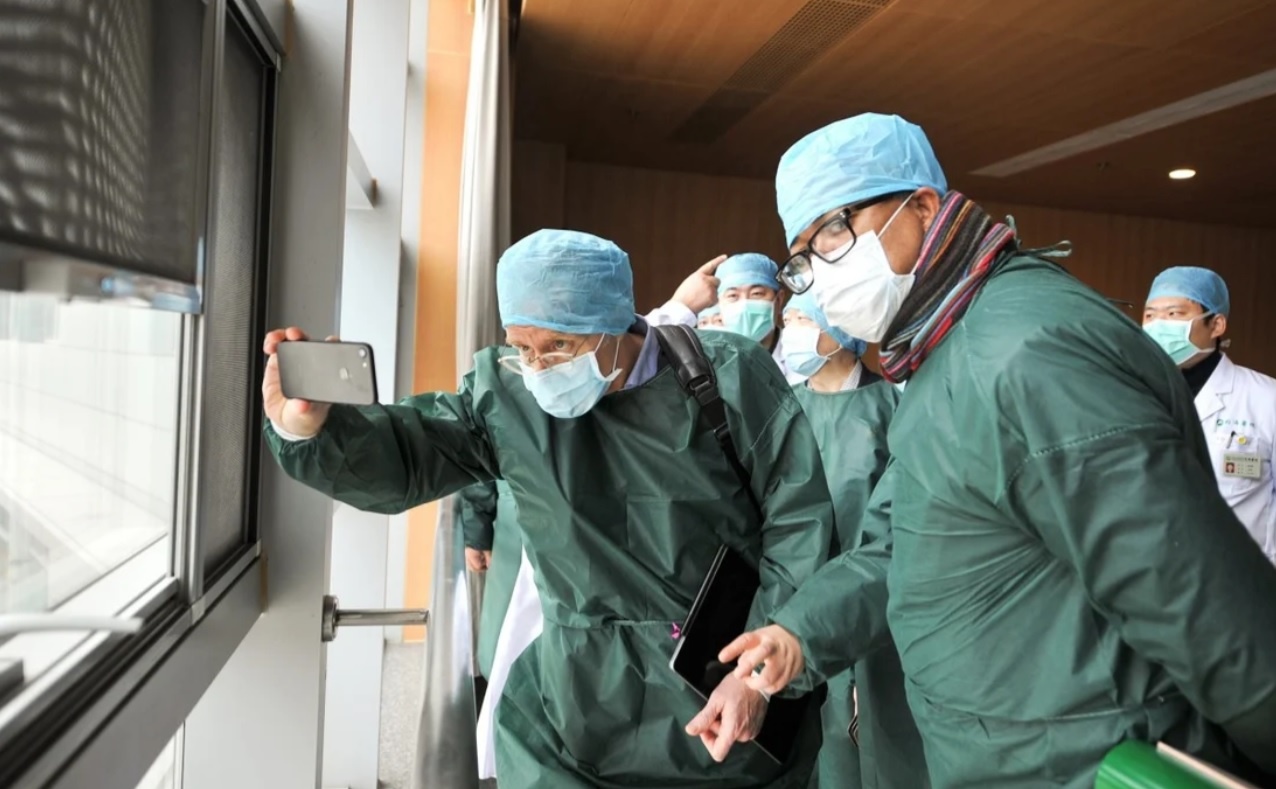 My va 13 nuoc dong minh chi trich bao cao nguon goc Covid-19 cua WHO hinh anh