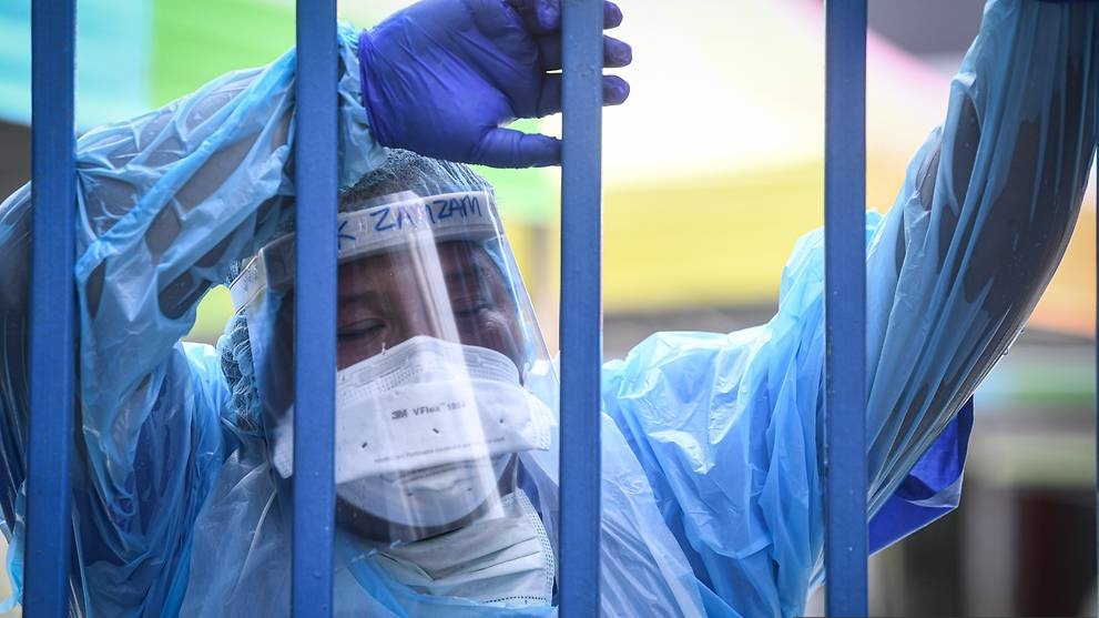 Malaysia ghi nhan hon 6.000 ca mac Covid-19 ngay thu ba lien tiep hinh anh