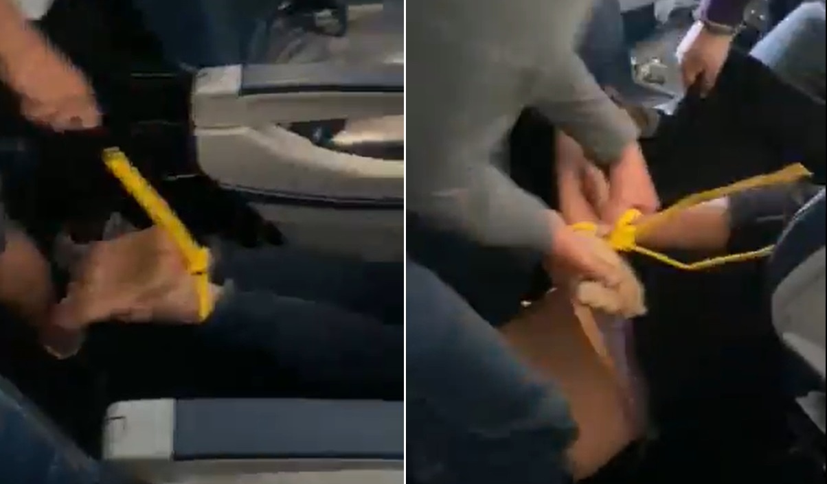 May bay ha canh khan cap vi hanh khach co lao vao buong lai hinh anh