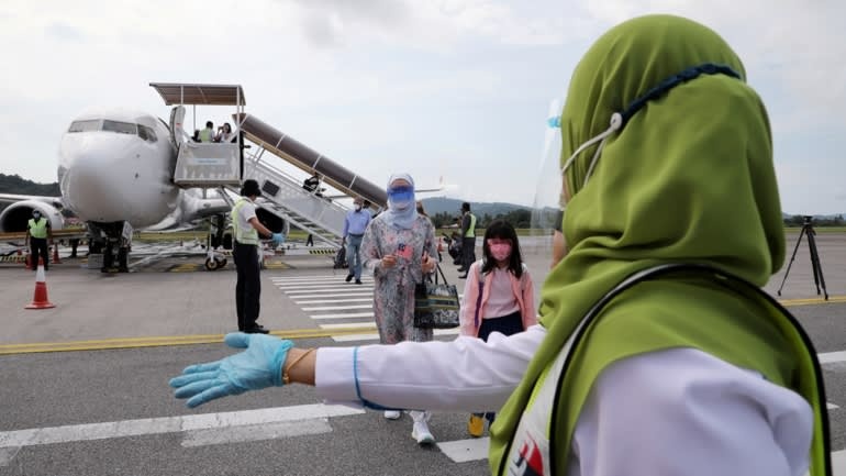 Malaysia co the mo cua bien gioi vao thang 11 hinh anh