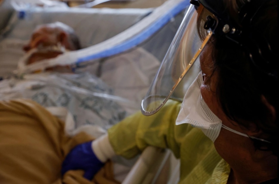 Mot nam sau lieu vaccine dau tien, My dang tro lai thoi ky dinh dich hinh anh