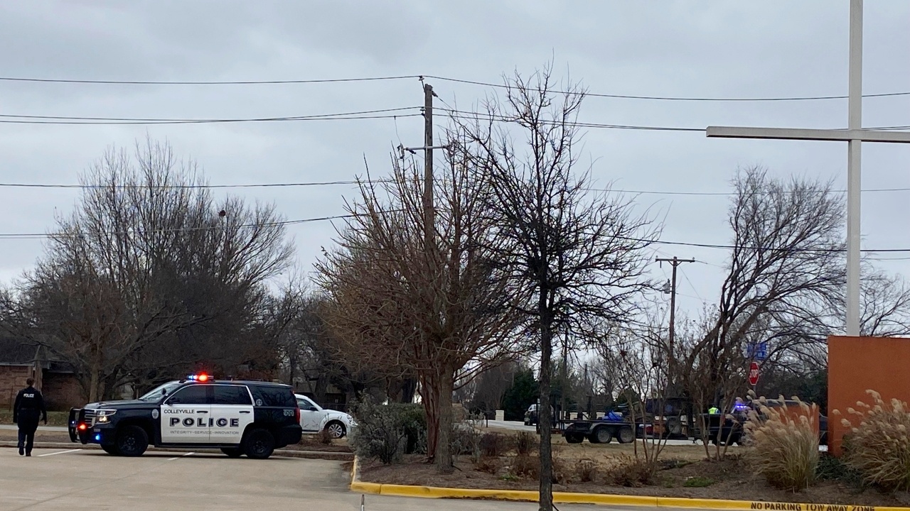 tay sung bat giu 4 con tin o Texas anh 2