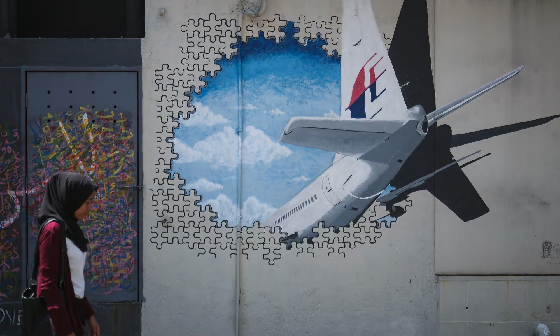 Di khap the gioi tim kiem manh vo MH370 hinh anh