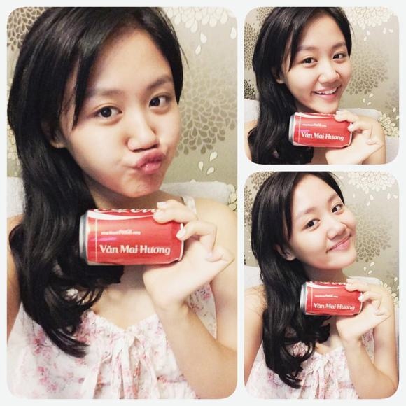 Văn Mai Hương “tự sướng” với lon Coca-Cola in tên mình.