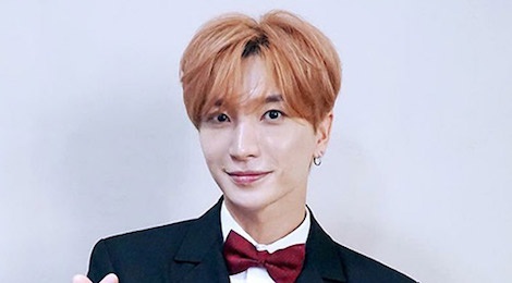 Truong nhom Super Junior bi ep mac ao phao day giua thoi tiet 38 do C hinh anh