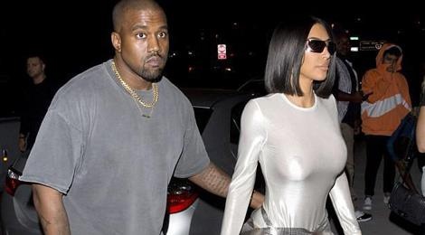 10 lan Kim Kardashian gay soc vi khong mac noi y xuong pho hinh anh