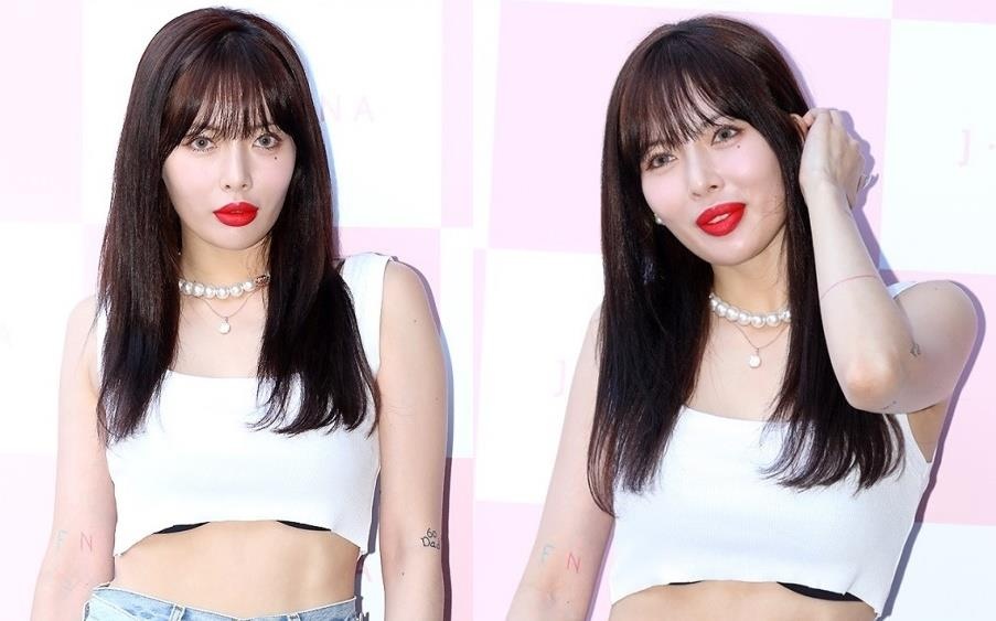 HyunA tiep tuc ho ao nguc sau on ao mac phan cam tai su kien hinh anh