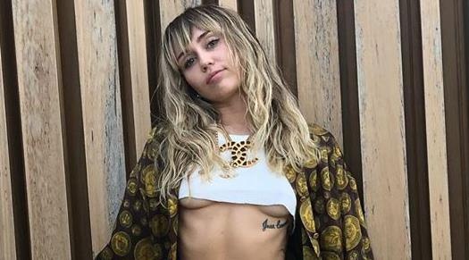 Miley Cyrus bo nhan cuoi, dang anh nhay cam truoc khi chia tay chong hinh anh