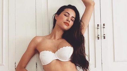 Pham Huong dang anh mac noi y, bi soi vong mot khong deu hinh anh