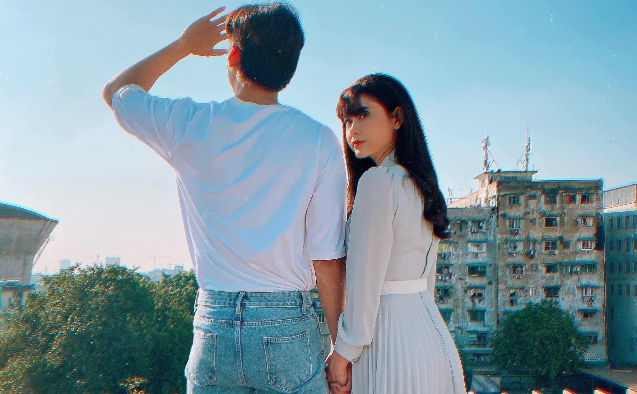 Truong Quynh Anh dang anh nam tay chang trai giau mat hinh anh