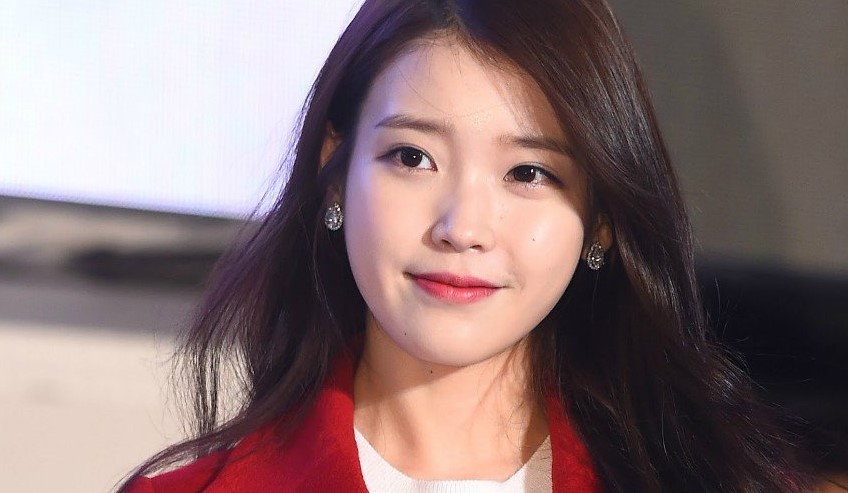 IU quyen gop gan 265.000 USD chong dich Covid-19 hinh anh