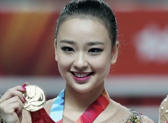 Cham dut tinh duc hoa trang phuc cua van dong vien nu o Olympic hinh anh