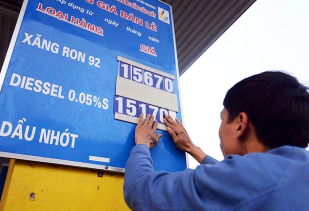 Xang giam gia, ganh nang Tet voi dan hinh anh