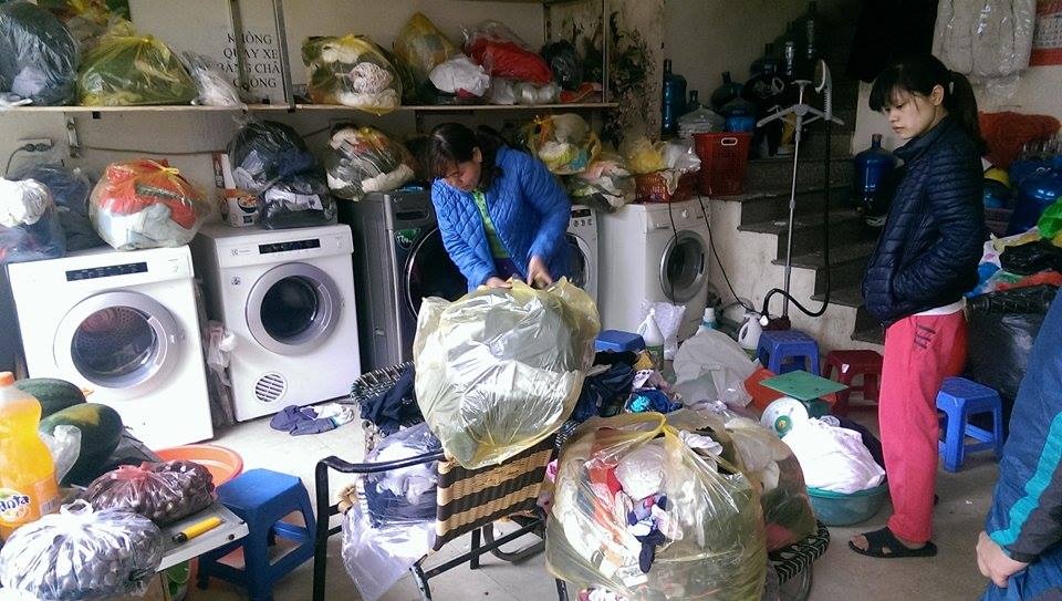 Dich vu giat la kho o Ha Noi hot bac ngay can Tet hinh anh