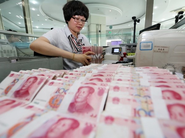 Trung Quoc dieu chinh ty gia co tao ra 'cuoc chien tien te'? hinh anh