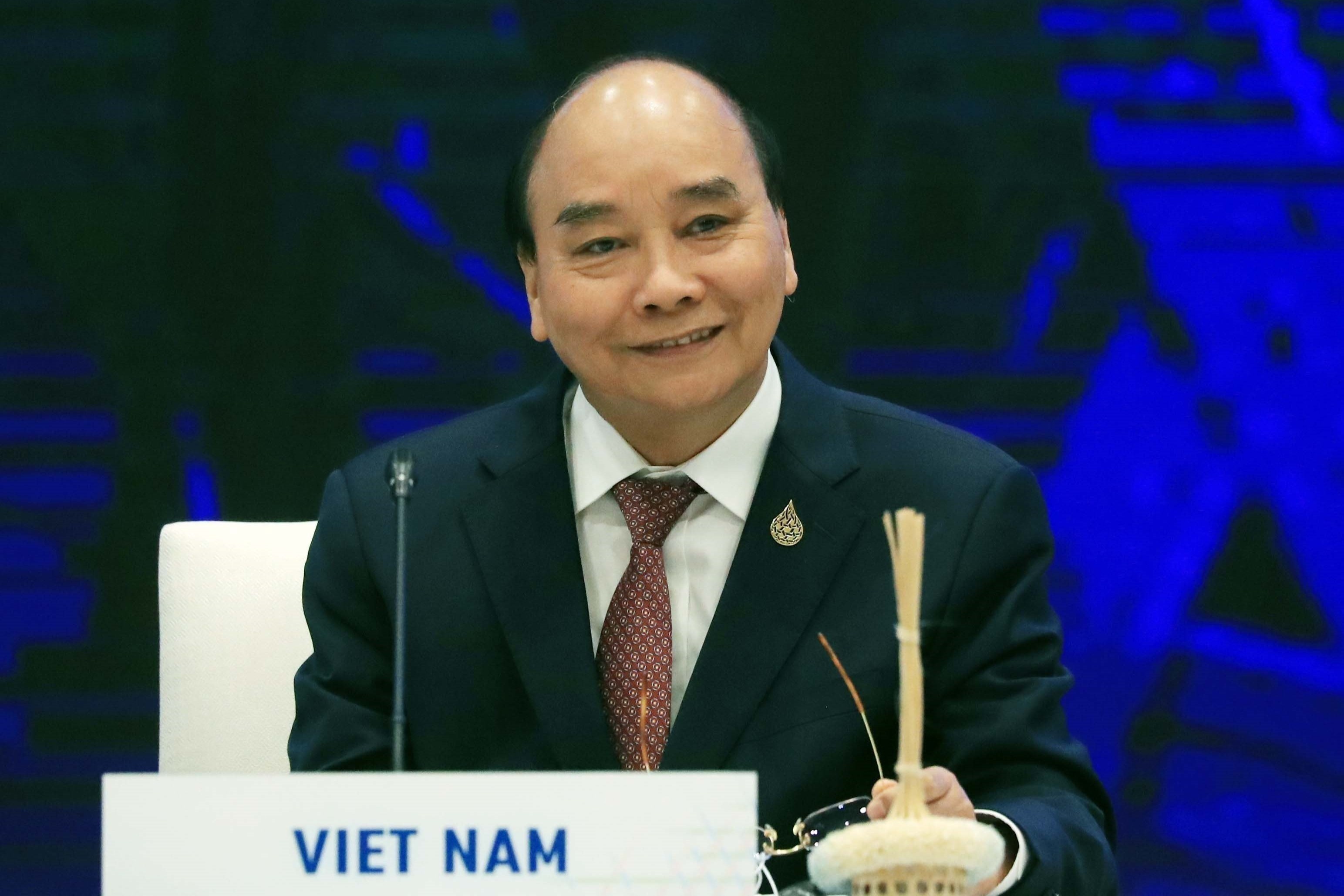 Chu tich nuoc keu goi cac thanh vien APEC vuot qua su khac biet hinh anh