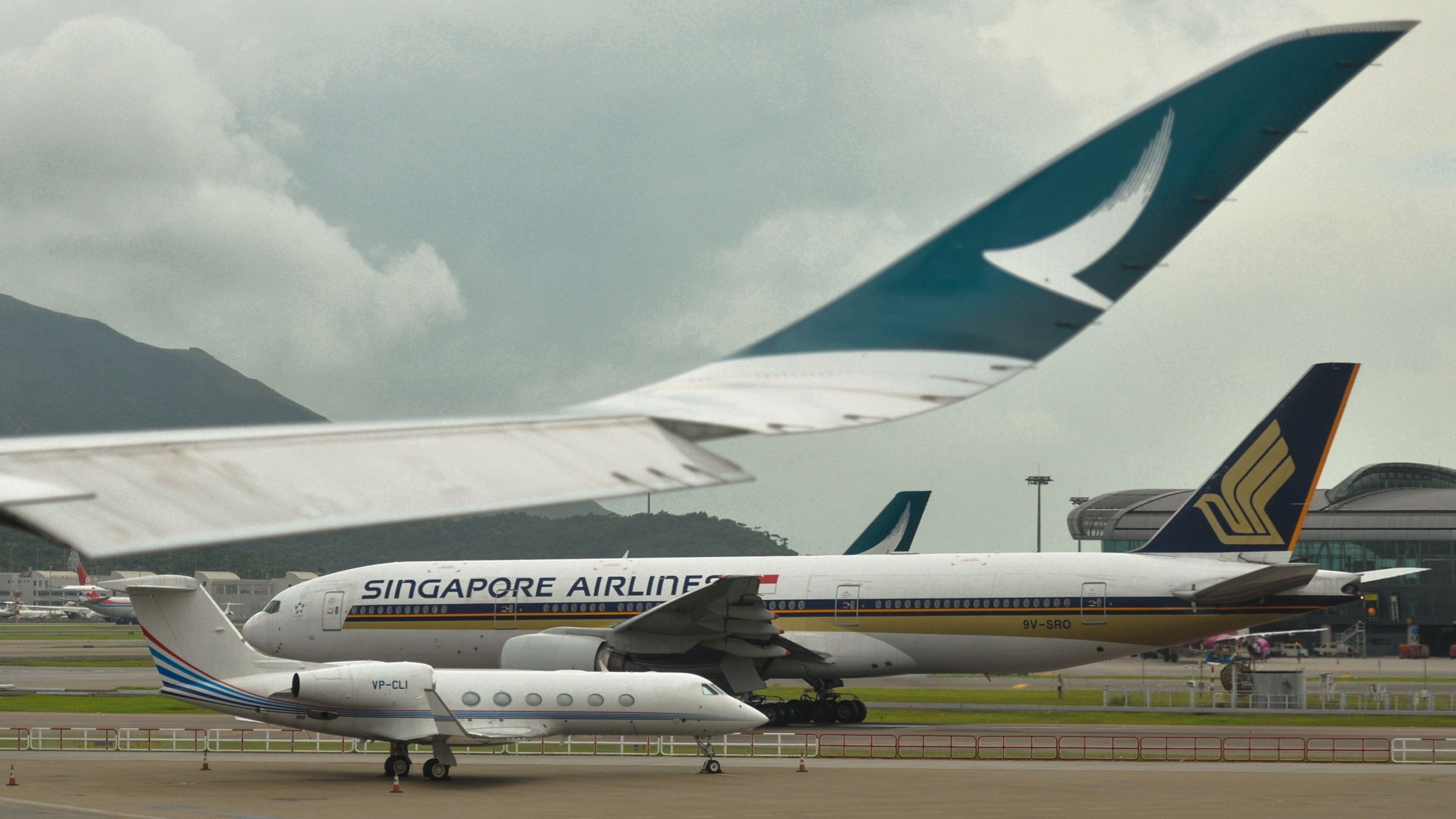 Da co nguoi thang trong cuoc dua Singapore Airlines - Cathay Pacific hinh anh
