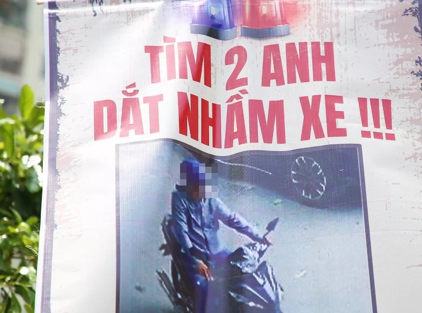 Chuyen cong an tim nguoi treo bien ‘tim anh dat nham xe’ khap Ha Noi hinh anh
