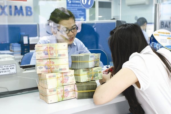 Thong doc Ngan hang Nha nuoc: No xau se ve 3% cuoi nam nay hinh anh