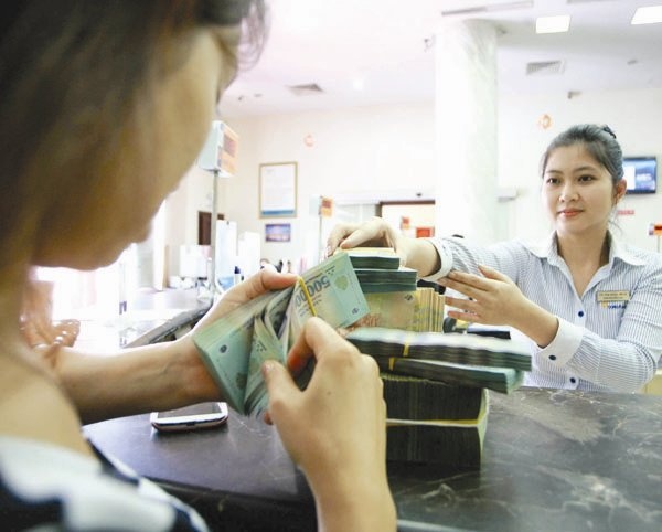 NHNN dang muon keo lai suat ve muc hop ly hon nua hinh anh