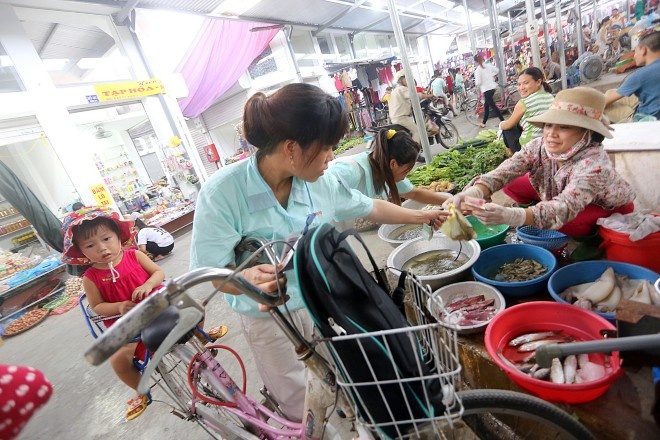 Muc luong va doi song cong nhan: Khong lam them thi doi! hinh anh