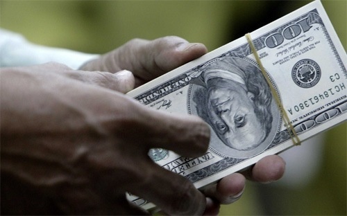 Ngan hang Nha nuoc neu ly do tang 1% ty gia hinh anh