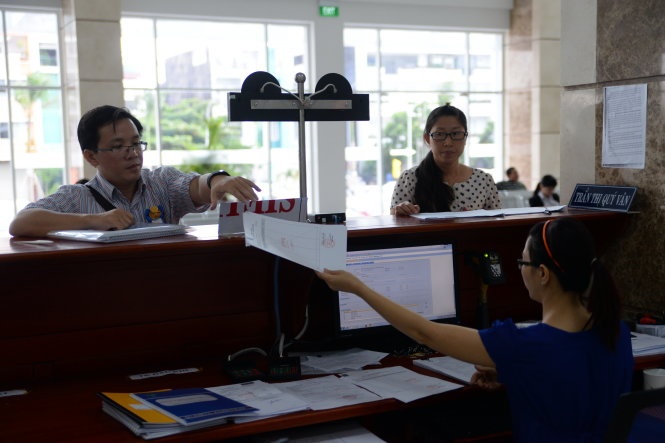 Viet Nam van can toi 770 gio de nop thue hinh anh