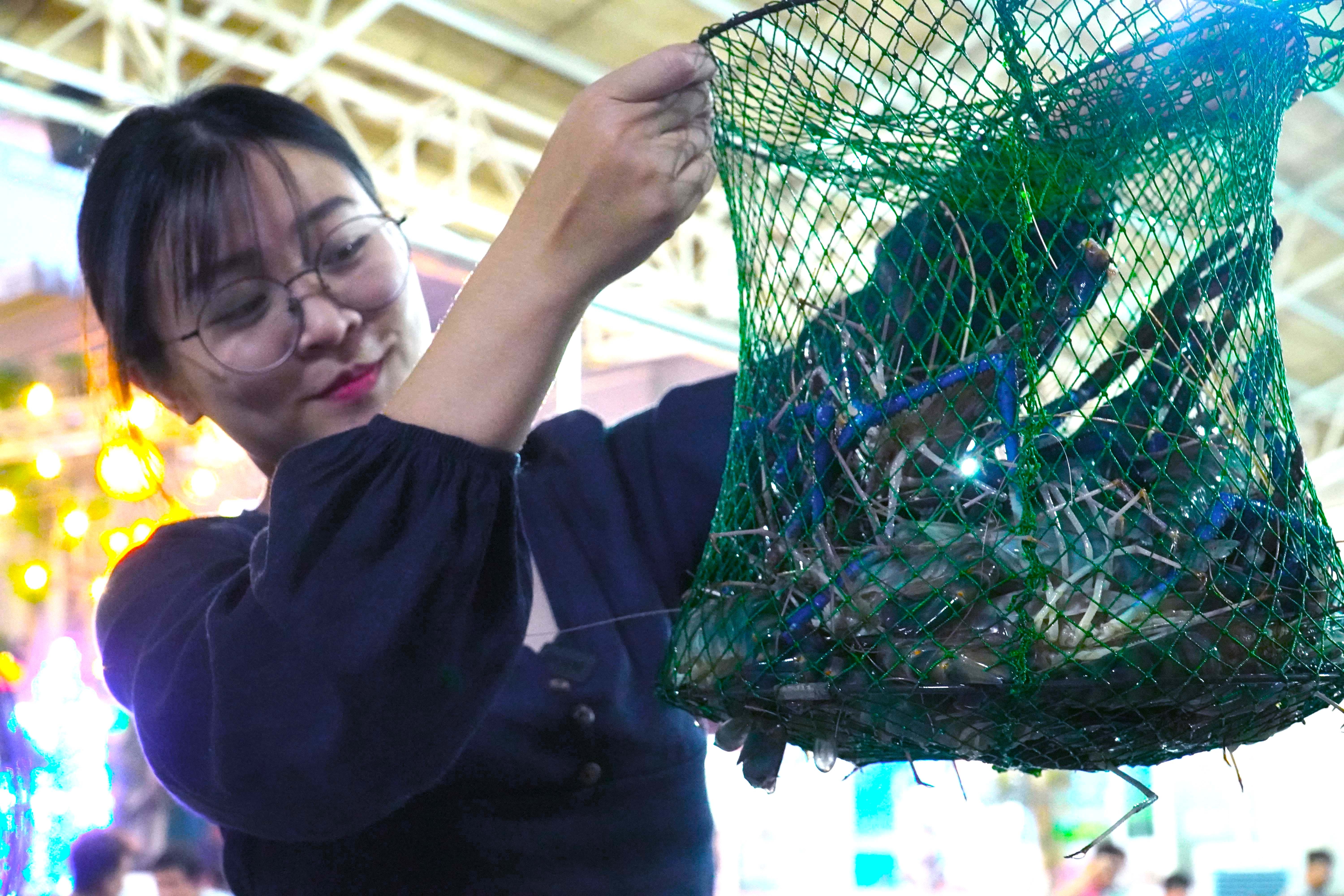 Cau tom an tai cho o TP.HCM hinh anh