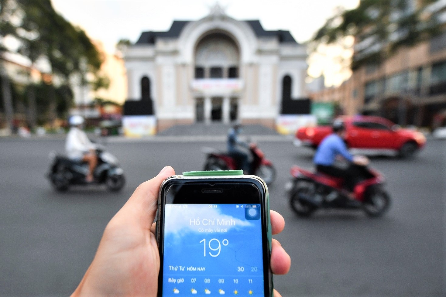 Nguoi dan TP.HCM: 'Toi mac 3 lop ao van lanh' hinh anh