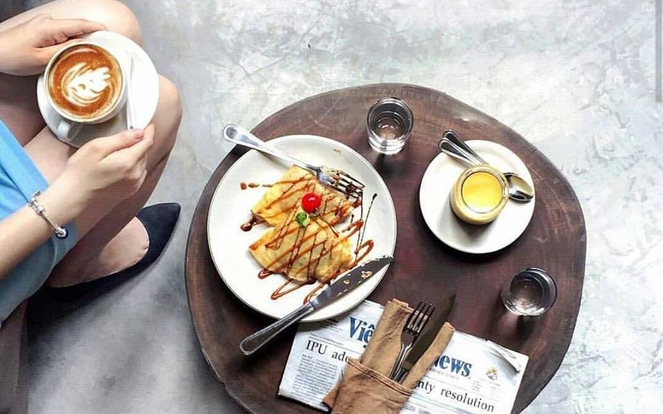 Nhung quan ca phe xinh xan phuc vu xuyen Tet o Ha Noi hinh anh