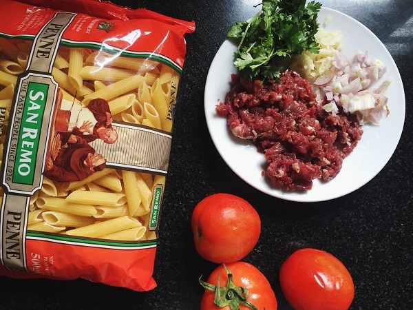 Cong thuc lam nui xao bo bam sot ca chua hinh anh