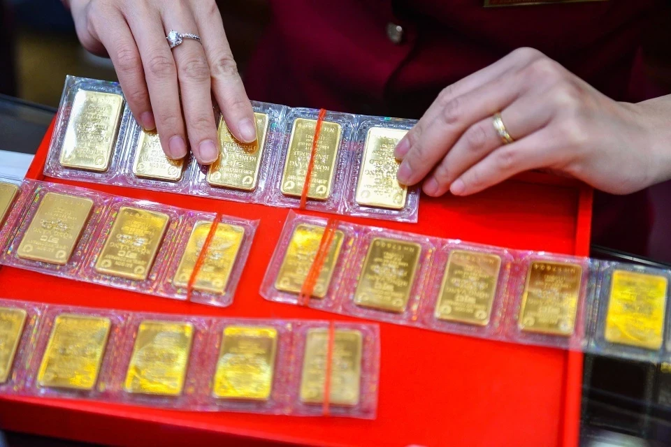 Gia vang dao chieu hinh anh