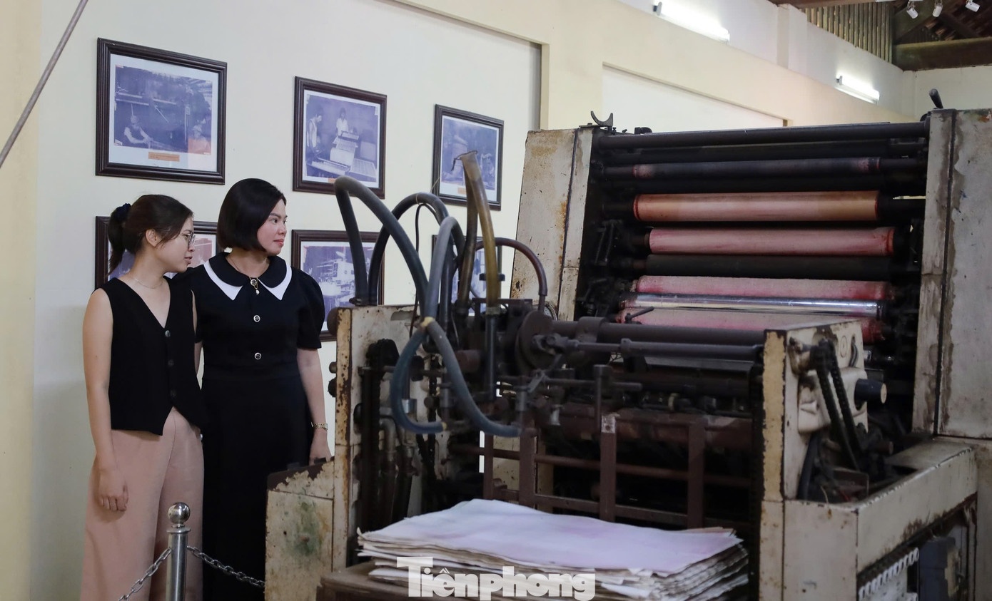 nha may in tien anh 6