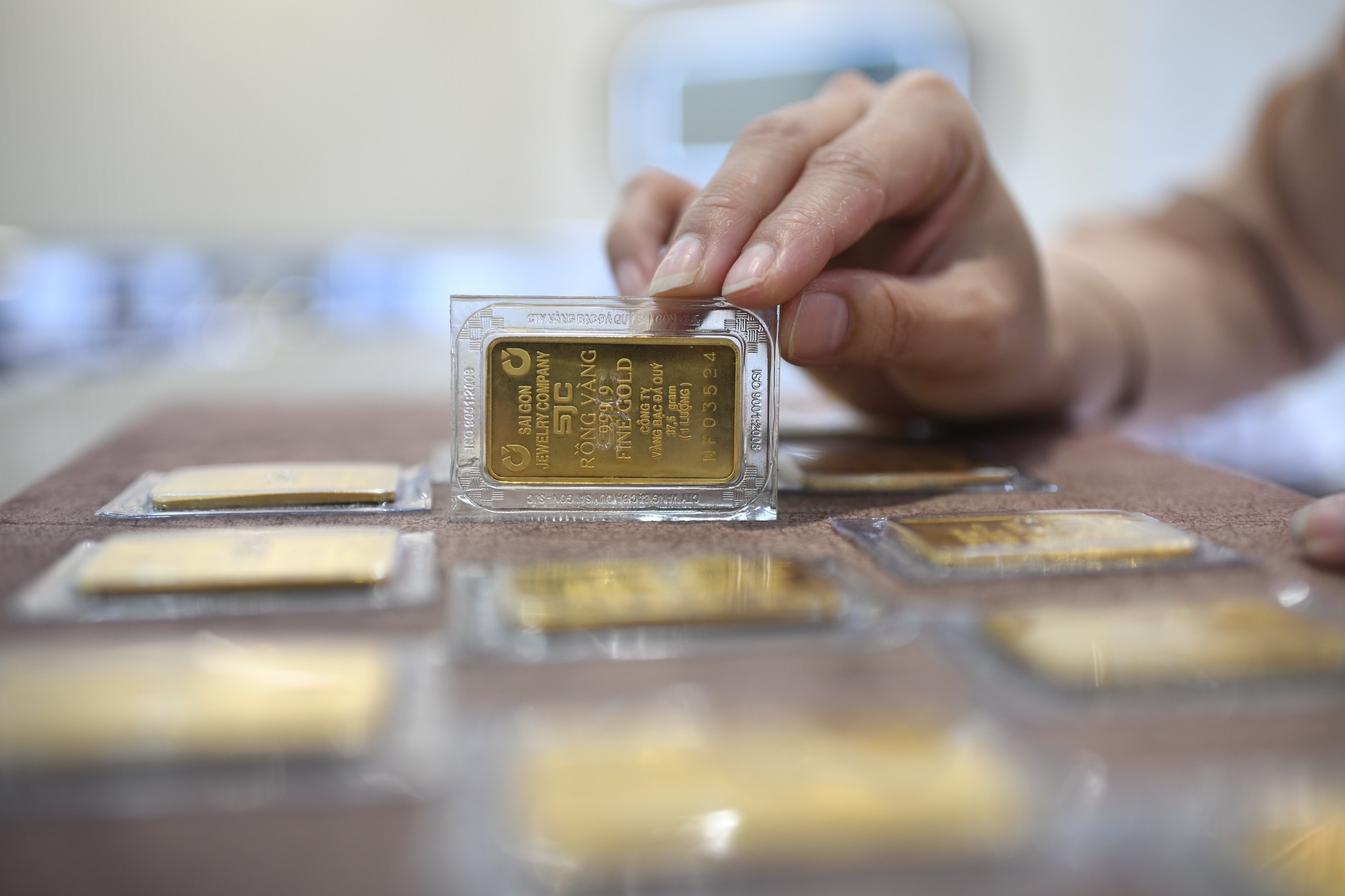 NHNN tinh mo 'room' vang cho cac ngan hang len 5% von tu co hinh anh