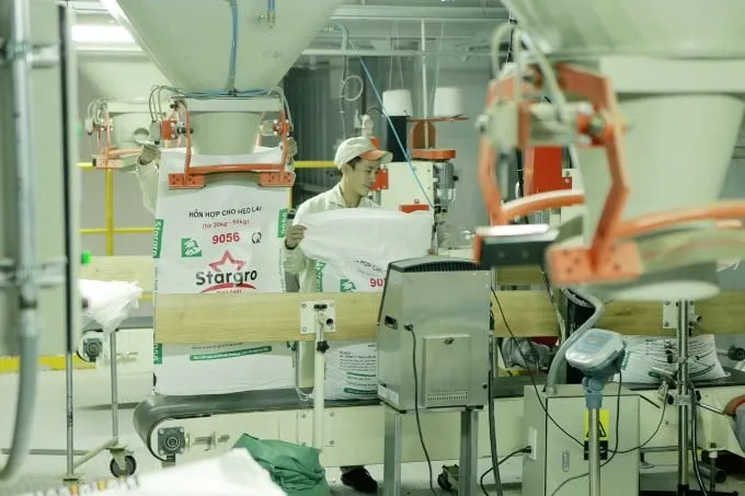 Doanh nghiep san xuat truoc ap luc xang dau, ty gia bat tang hinh anh