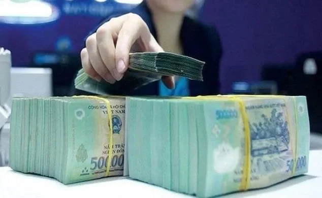 Sau nghi le, co dong nhieu doanh nghiep 'rung rinh' co tuc tien mat hinh anh