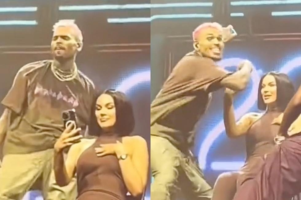 Chris Brown giat dien thoai cua fan, nem xuong san khau hinh anh