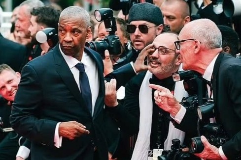 Denzel Washington gian du tren tham do Cannes hinh anh