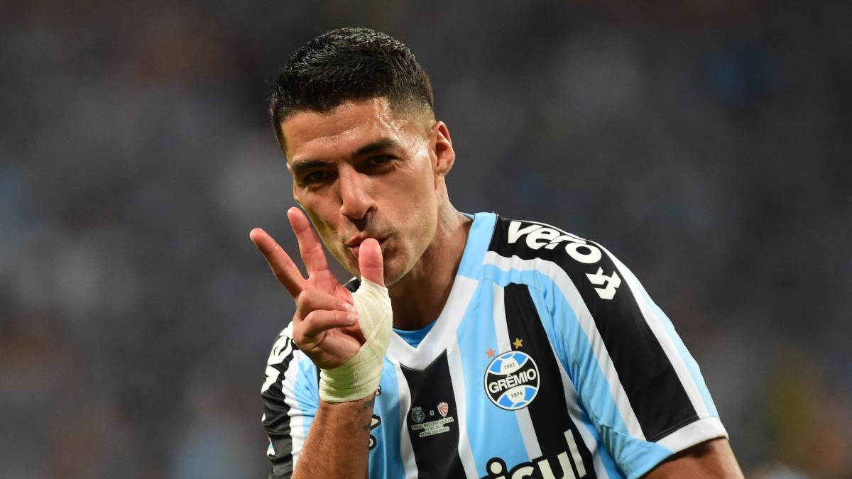 Suarez can nhac giai nghe hinh anh