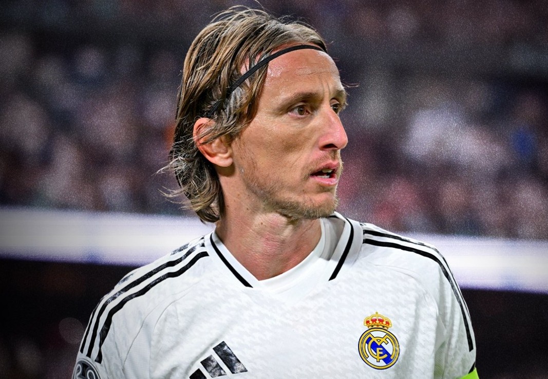 Ly do Real Madrid chia tay Modric hinh anh