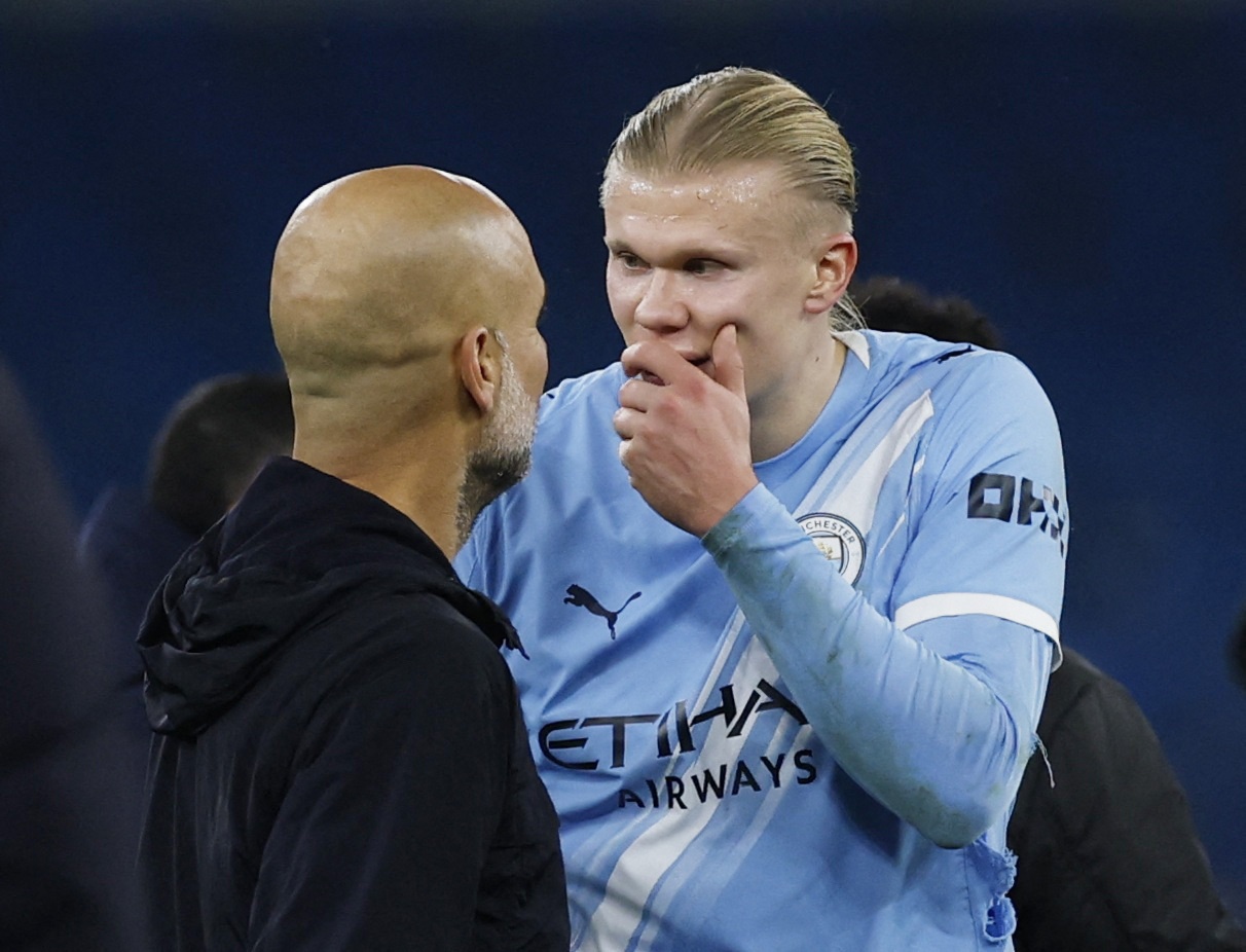 Haaland va Guardiola tranh cai hinh anh