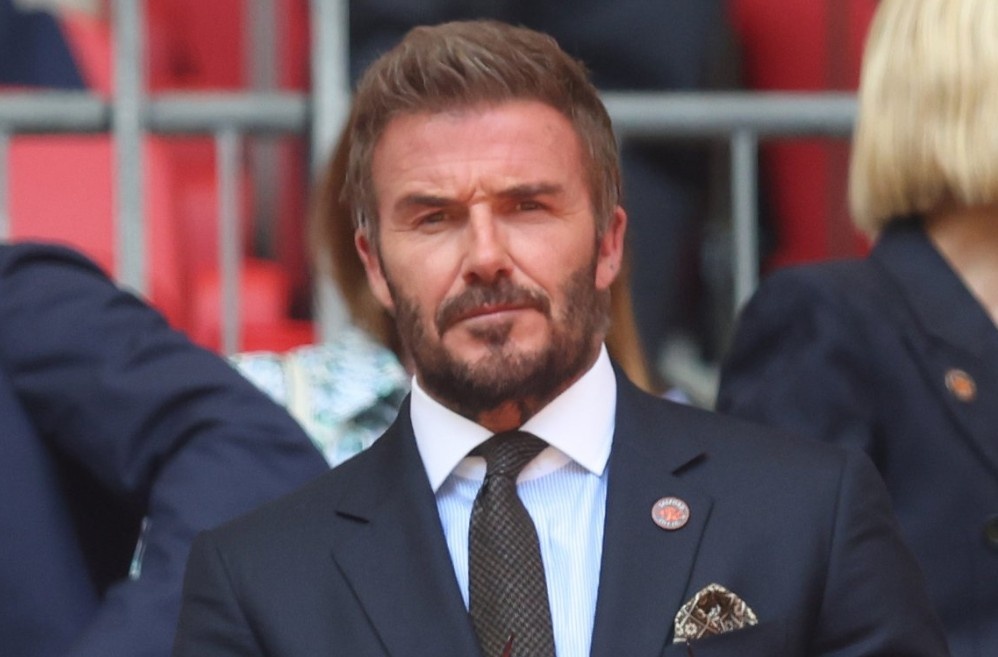 Doi cua Beckham sa thai HLV gay soc hinh anh