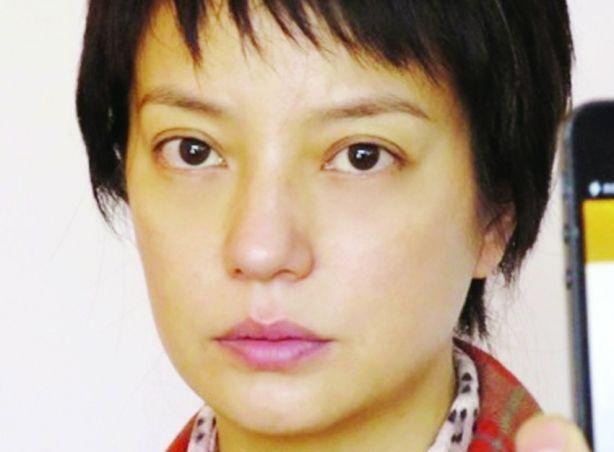 Trieu Vy cat toc ngan dong vai ba me nha que mat con hinh anh